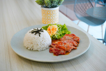 Indonesian Chicken in Red Sauce Served with Steamed Rice and Vegetables