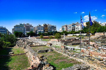 Ancient Roman forum in Thessaloniki with ruins and Modern Urban Backdrop
