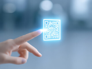 Futuristic glowing QR code floating above finger with soft blue background, technology concept with digital interface and scanning interaction
