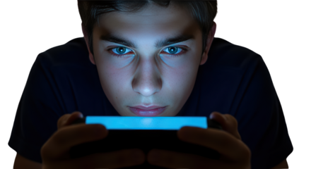 a teenager at staring boy Teenage smartphone intensely screen glowing screen. man teen young