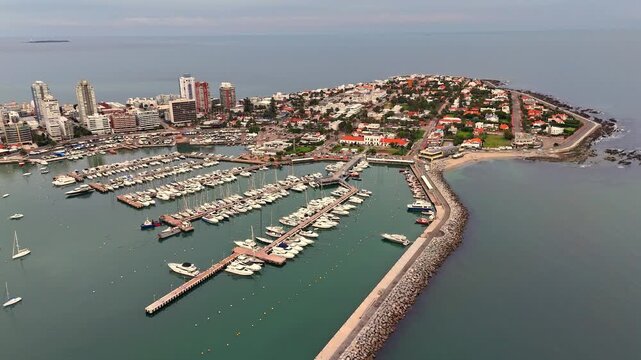 Aerial footage of Punta del Este Port at sunset in Punta del Este city, Maldonado, Uruguay