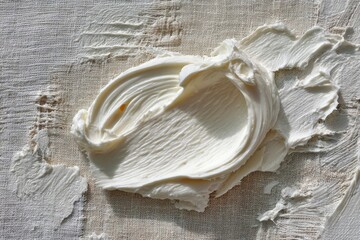 Creamy spread on a textured surface