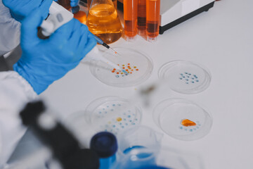 Collaboration, tablet or science with people in lab together for research or development....