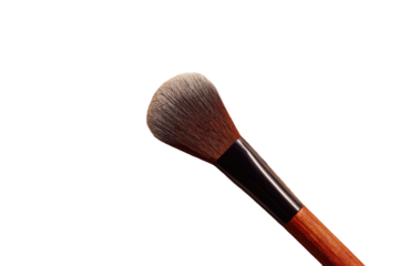 Close-up of a makeup brush, light-brown/tan handle, black ferrule, fluffy light-gray/brown tip