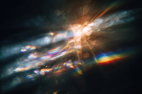 light leak overlay effect with blur orange light leaks and bokeh, retro grain noisy film distressed texture light leak flare on black background, retro film overlay