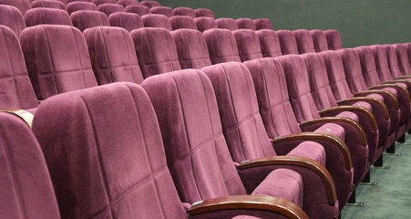 Purple seats in cinema theater opera concert hall 