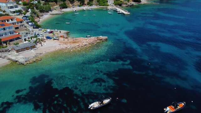 Zavala beach taken with my drone, showing the beautiful blue water and little fishing boats.