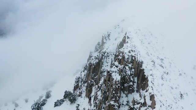 Aerial view of heavy snowfall over the mountains of the village of Castell de Castells in the province of Alicante, Spain.