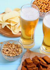 beer and snacks on the table. Beer snacks.. Vertical photo format