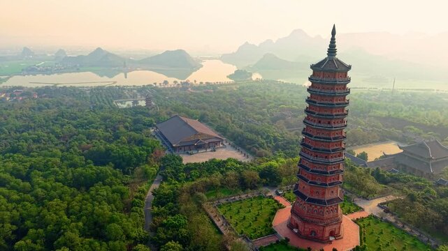 Aerial view of bai dinh pagoda and mountains at sunset in Ninh Binh, Vietnam.