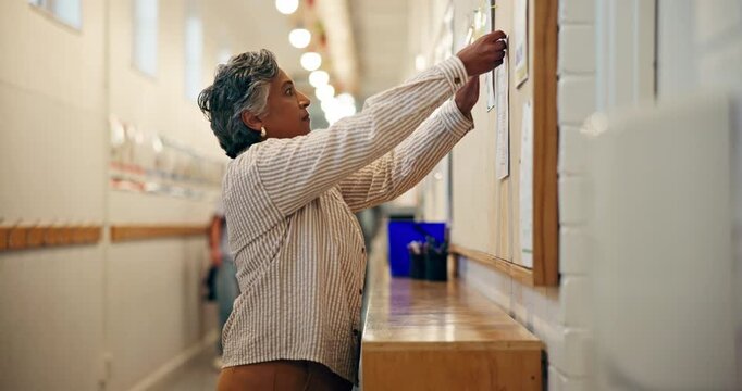 Woman, principal and rules with notice in school for regulations, attendance or boundaries. Female person, authority or executive teacher with documents on board for code of conduct in class hallway