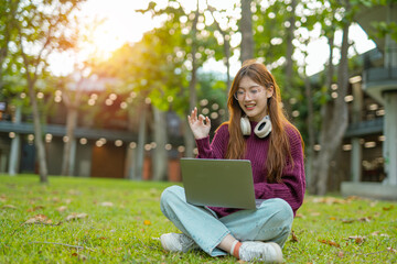 Study of portraits and female students at a university park to learn or study, scholarship books and laptops.