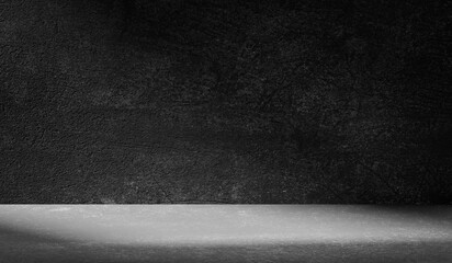 Dark light gray background with cement wall texture. Minimalist abstract background for product presentation with soft shadows from the window.