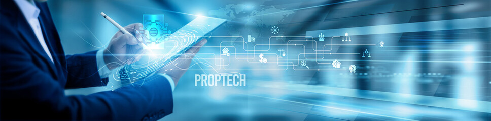 The real estate tech team is using a tablet and analysis. PropTech innovation, property data...