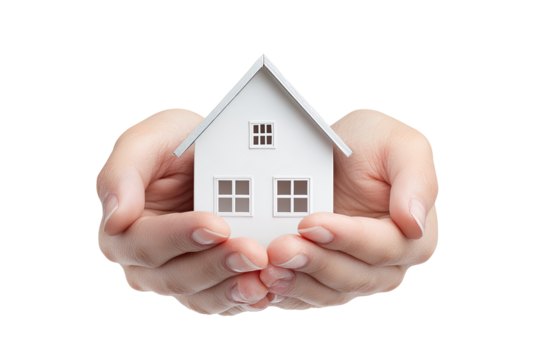 A small white house model cradled gently in two hands