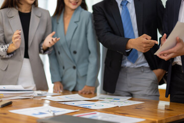 Business meeting, coworkers are discussing in the conference room. Group of business colleagues are discussing and sharing business planning ideas with colleagues.