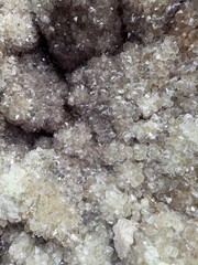 Natural Crystal Formation: A stunning macro view of the intricate, sparkling crystals revealed inside a split geode, showcasing the beauty of natural geology.