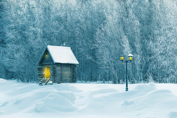 Winter New Year Christmas minimalist image. Village hut and lantern in snowy forest.