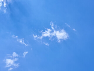 Clear Blue Sky with Light White Clouds