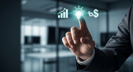 A hand touching a screen with business icons in a modern office setting with blurred background