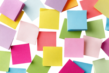 Colorful sticky notes scattered across a surface