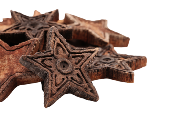 Close-up of several carved wooden stars