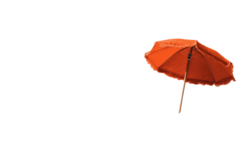 Single orange umbrella against black background