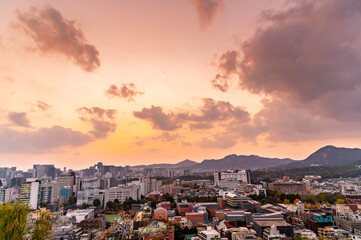Gold sun risae or sunset of Seoul cityscapes with high rise office buildings and skyscrapers in Seoul city, Republic of Korea in winter season