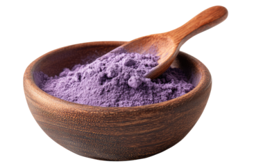 Purple powder in wooden bowl with wooden spoon