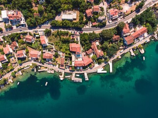 From above, Kotor Bay displays its beauty. Homes with terracotta roofs line the Adriatic Coast,...