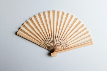 Elegant Wooden Fan on Minimalist Background for Decorative Use