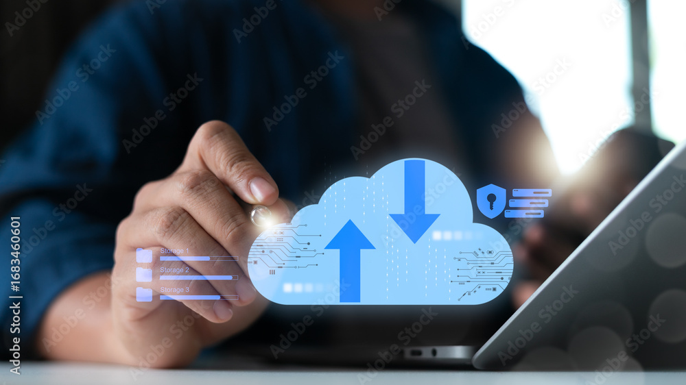 Poster close-up of a businessman using a laptop with hologram cloud computing upload and download icons. co