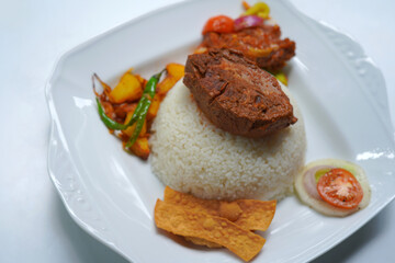 Delicious Rice and Curry Platter with Spicy Devil Chicken.