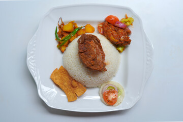 Authentic Sri Lankan Rice and Curry with Hot Devil Chicken.