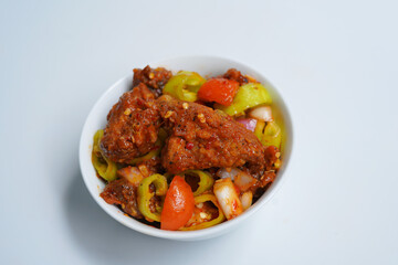 Savory Devil Chicken Dish in White Bowl for Dining.