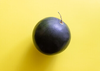 Watermelon on a yellow background. Healthy eating. Vegetarian food. Minimalism.