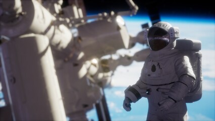 An astronaut conducts a spacewalk, floating gracefully near the International Space Station against the breathtaking backdrop of Earth. The view reveals stunning blue oceans and white clouds.