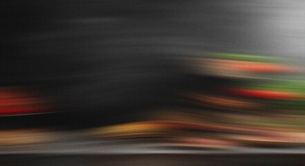 Blurred Motion Abstract Background with Red Green Yellow and Dark Tones motion blur