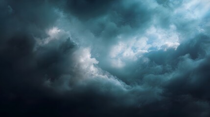 Obraz premium Dramatic stormy clouds fill the vast sky with dark moody textures where bright light breaks through creating an intense weather atmosphere