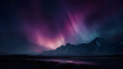 Vibrant aurora borealis streaks across the dark night sky illuminating snow capped mountains and reflecting in tranquil water below