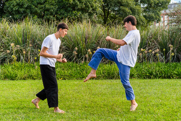 A dynamic Taekwondo session under the sun