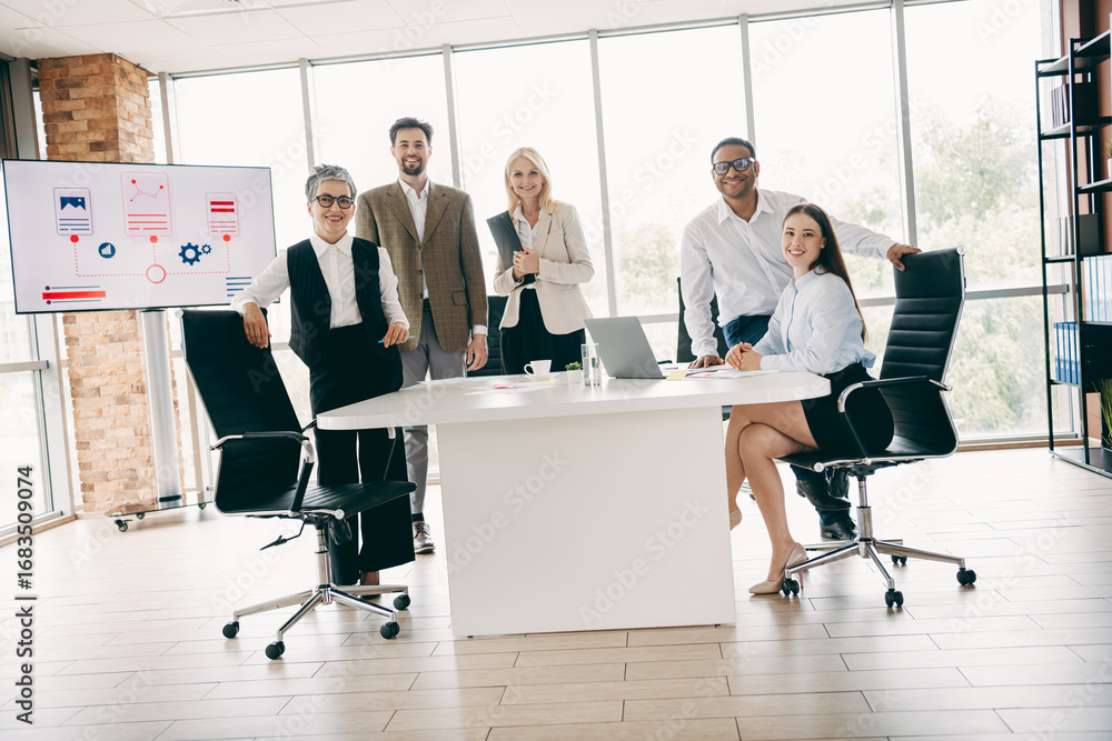 Aufkleber group of professional coworkers collaborating in a modern office space with various tools and teamwo