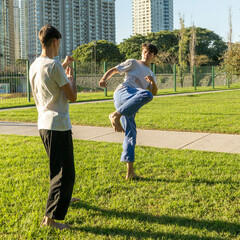 Young martial artists sparring with focus and determination