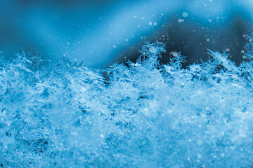 Close-up of delicate snowflakes conveying the crystalline beauty of winter.