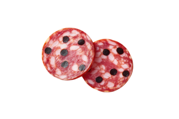 Two slices of salami, circular, with dark spots