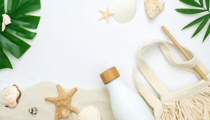 Flat lay featuring seashells, sand, and marine-themed eco-friendly products including bamboo straw, reusable bottle, and jute bag on a clean white background