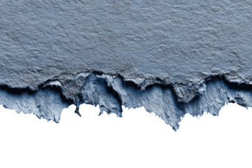 Close-up of a torn piece of textured, light-gray paper, ragged edges against a black background