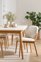 Modern dining room with light-colored wooden furniture and light beige accents