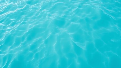 Obraz premium Abstract aerial view of turquoise water with soft wave patterns and gradient blue tones, evoking summer serenity.