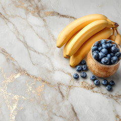 Bananas and blueberries on a marble surface